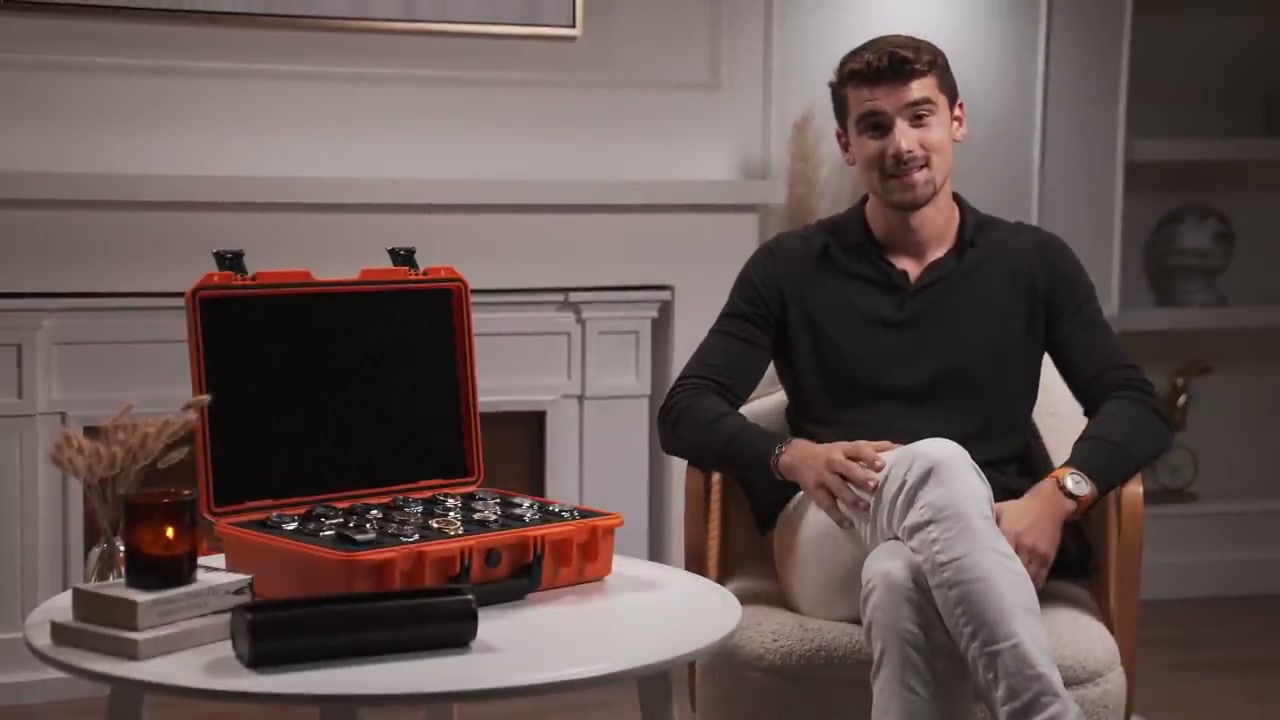 Iman Gadzhi wearing a luxury watch beside his open watch collection