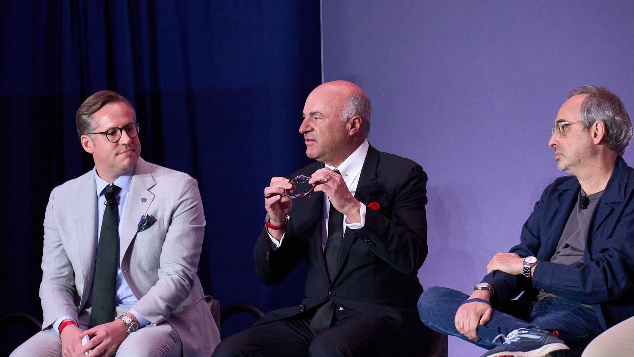 Kevin O'Leary wearing watches from his collection on both wrists